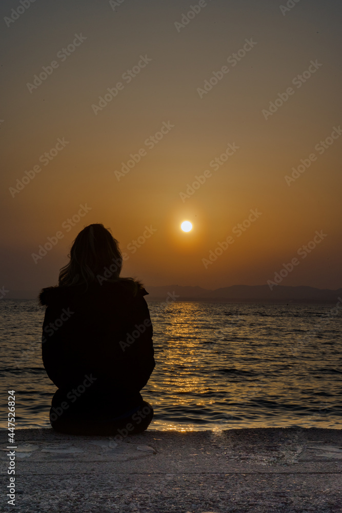 Fototapeta premium silhouette of a person at sunset