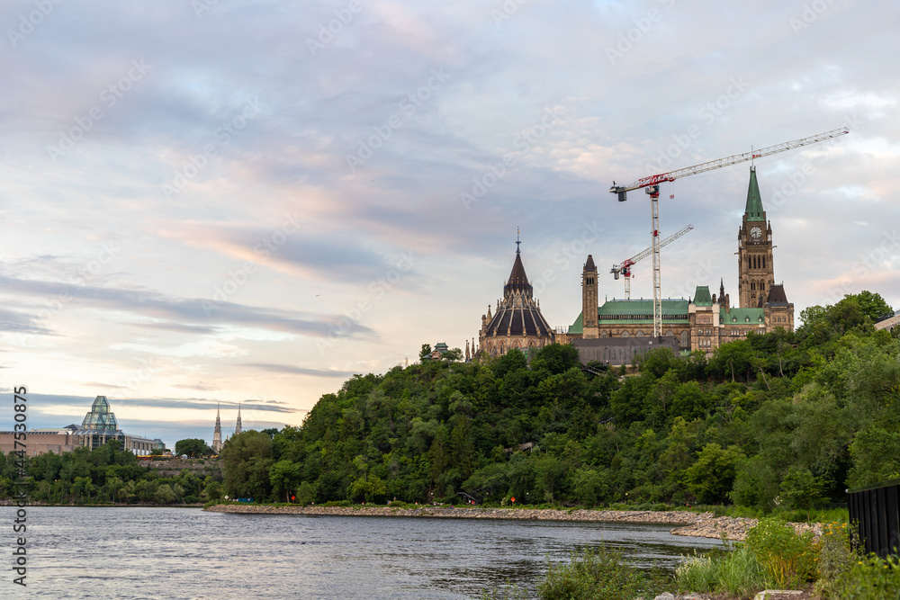 Panoramic view of Ottawa River, Parliament Hill and Alexandra Bridge in Ottawa, Canada