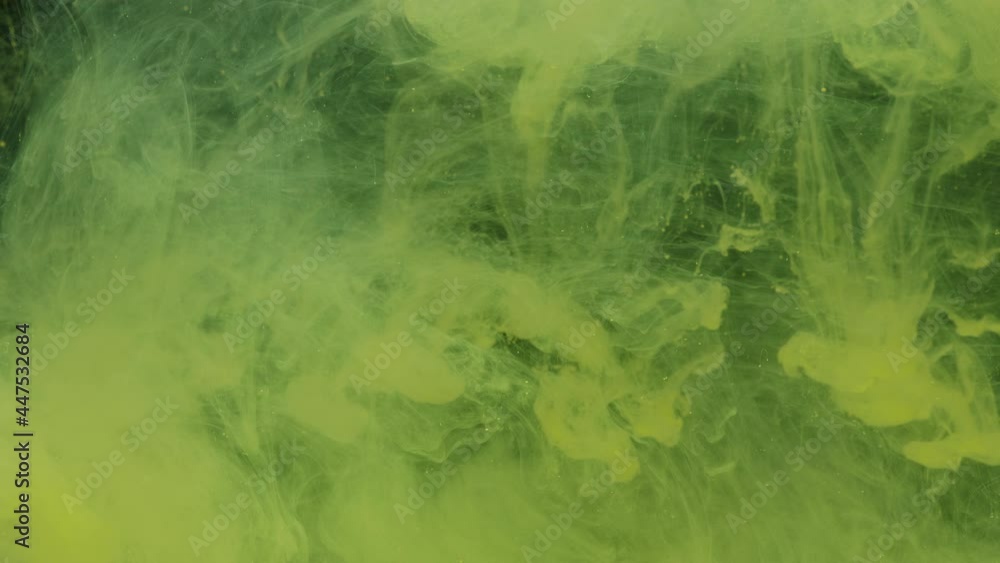 Yellow ink acrylic paint mixing in water, swirling softly underwater. Colored citric acrylic cloud of paint in aquarium. Slow motion abstract smoke explosion animation. Beautiful art background Yellow ink acrylic paint mixing in water, swirling softly underwater. Colored citric acrylic cloud of paint in aquarium. Slow motion abstract smoke explosion animation. Beautiful art background