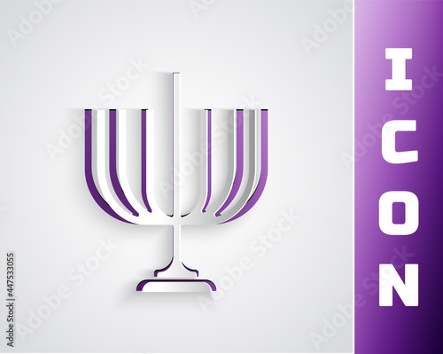 Paper cut Hanukkah menorah icon isolated on grey background. Hanukkah traditional symbol. Holiday religion, jewish festival of Lights. Paper art style. Vector