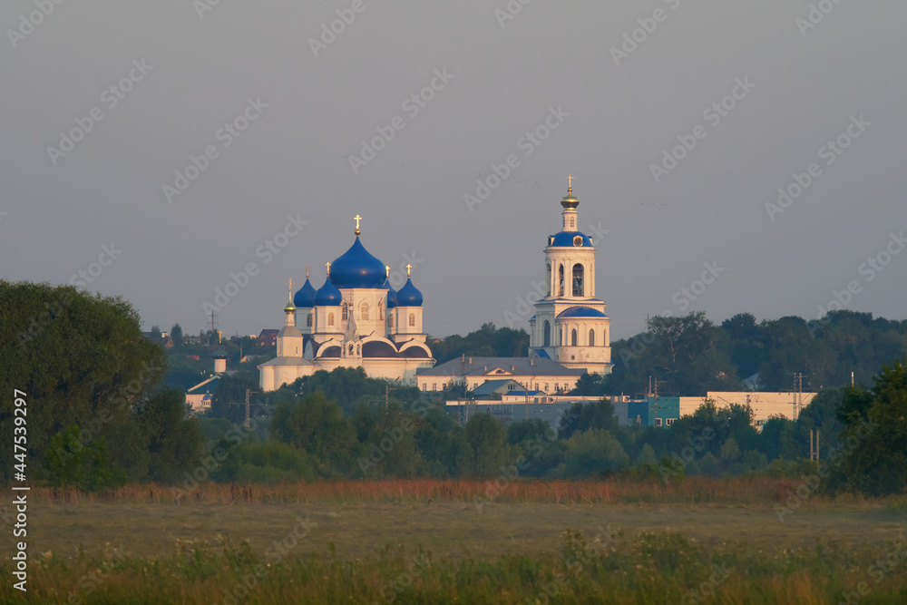 Russian Christian Orthodox church with domes and a cross against the sky. Russian Orthodoxy and Christian Faith concept