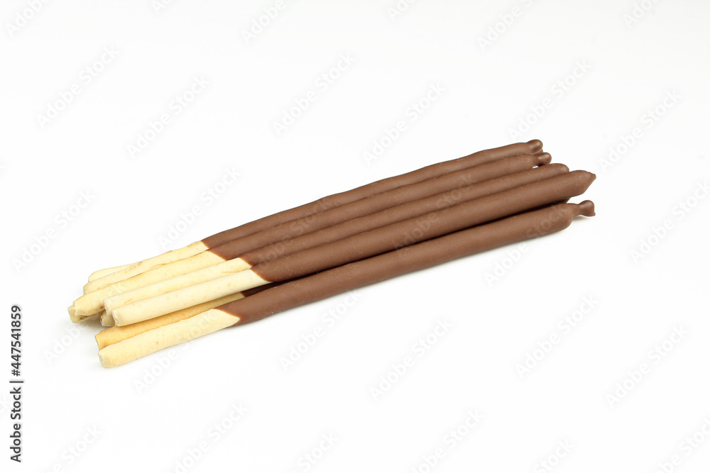 Biscuit sticks coated with milk chocolate. Biscuit sticks coated with milk chocolate.