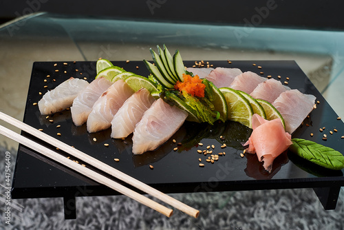 sushi time ingredients and plate niguiris photo