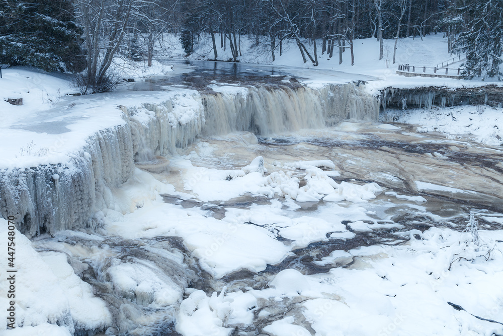Fototapeta premium Frozen Keila-Joa waterfall by winter. Harjumaa, Estonia