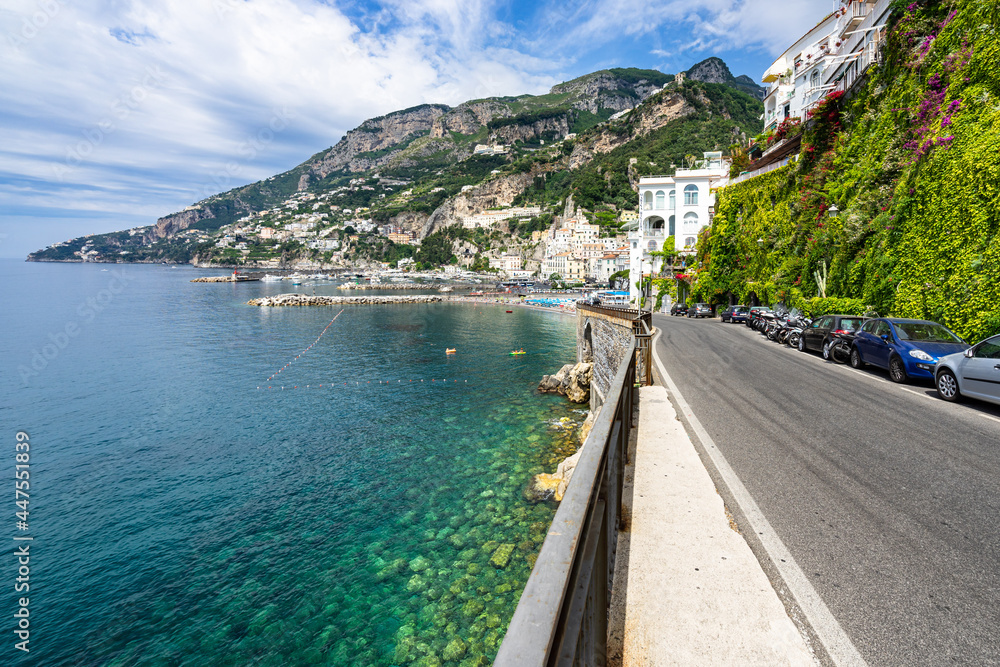 The famous coastal road of Amalfi Coast near Amalfi town overlooking on the Mediterranean Sea, Italy The famous coastal road of Amalfi Coast near Amalfi town overlooking on the Mediterranean Sea, Italy