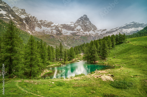 The scenic Blue Lake (Lago Blu) surrounded by a beautiful alpine landscape near Cervinia, Aosta Valley, Italy