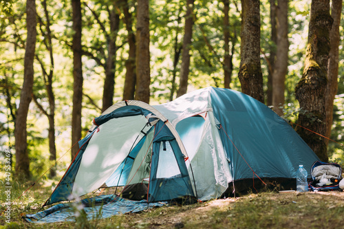 A tent in nature. Somebody is having a great time on a camping trip.