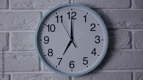 Wallpaper Mural The Time Is 7.00 AM Or PM On A Wall Clock With A Black Second Hand On A White Brick Wall. Time concept Torontodigital.ca