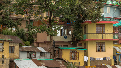 Facades of residential buildings on McLeod Ganj streets
