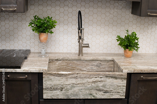 фотографія Detail of sink in the modern kitchen ceramic luxury steel