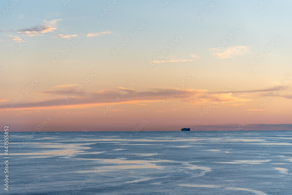 Beautiful sunset sky over the calm, peaceful ocean. Beautiful sunset sky over the calm, peaceful ocean.