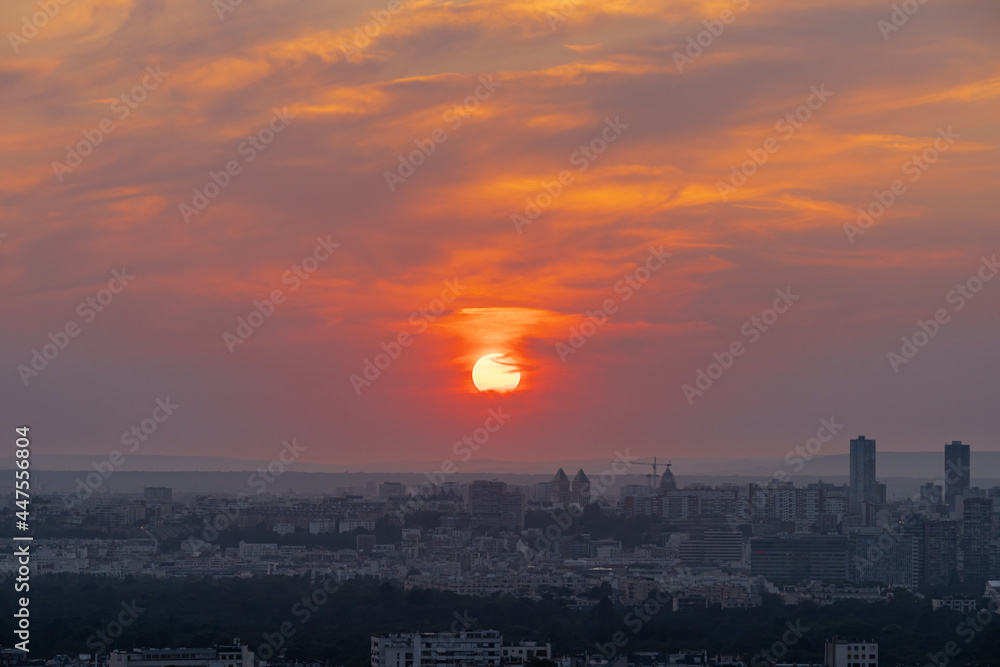 Paris, France - 07 22 2021: Eiffel Tower: Sunset over Paris and La Defense