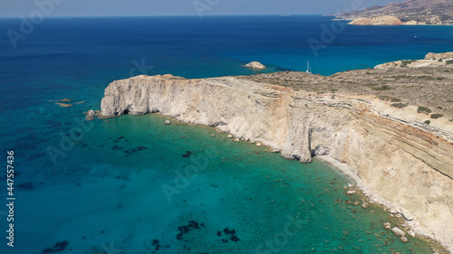 Aerial drone photo of beautiful volcanic emerald paradise bay below white rock with perlite mine, Milos island, Cyclades, Greece