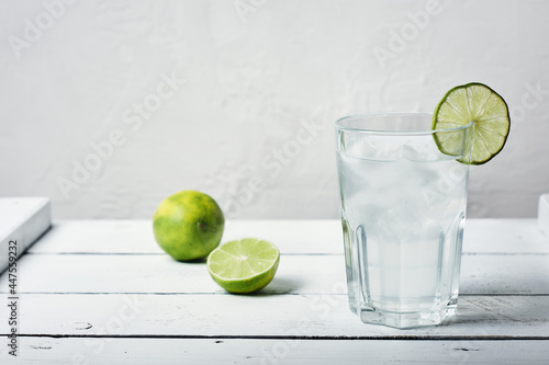 Cold lime drink with ice.