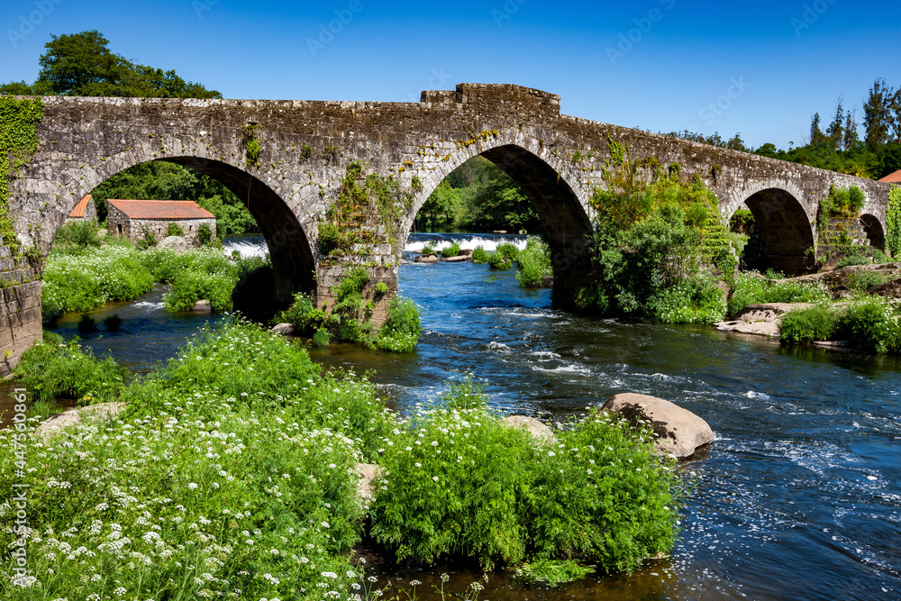Roman bridge on the Camino de Santiago near Maceda, Galicia, Spain, Europe.