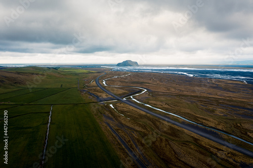 Aerial drone view of scenic road near Seljalandsfoss waterfall, Rangárþing eystra, Southern Iceland