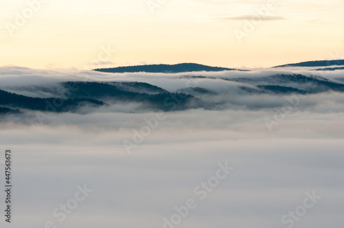 Solińskie Lake bathed in morning fog, Solina, Bieszczady, sunrise