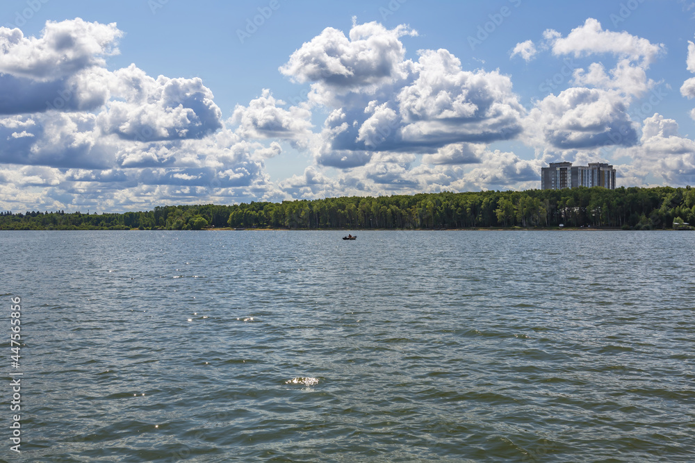 Beautiful natural summer landscape with picturesque lake Senezh and cloudy sky. Moscow region, Russia Beautiful natural summer landscape with picturesque lake Senezh and cloudy sky. Moscow region, Russia