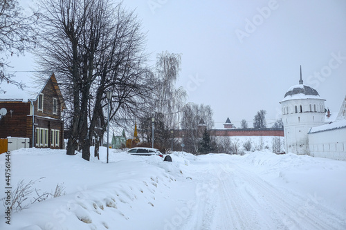 Winter landscape with the image of old russian town Suzdal