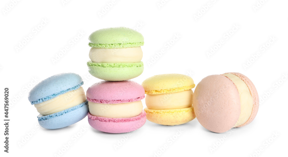 Many delicious colorful macarons on white background Many delicious colorful macarons on white background