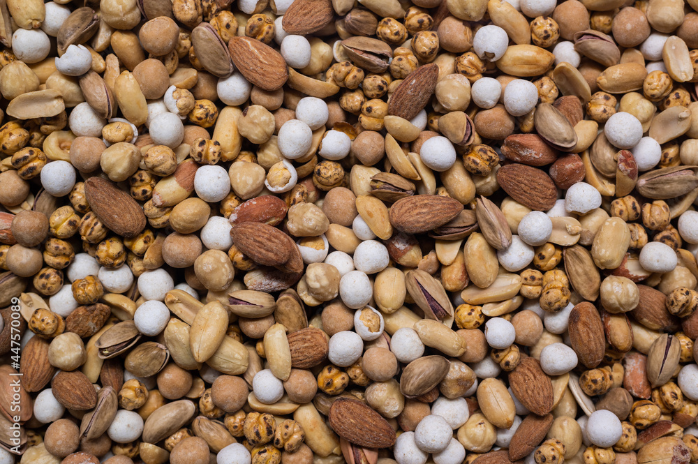 Mix of different nuts closeup photo to use as a texture or background. Mix of different nuts closeup photo to use as a texture or background.