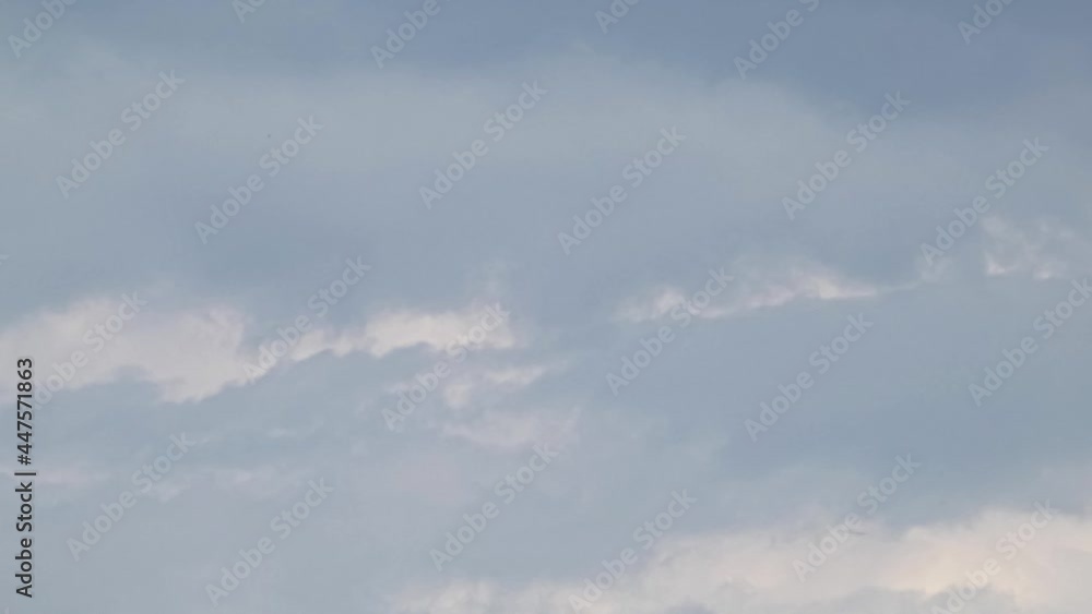 White and gray clouds move across the sky time lapse White and gray clouds move across the sky time lapse