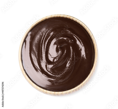 Delicious chocolate cream in bowl on white background, top view