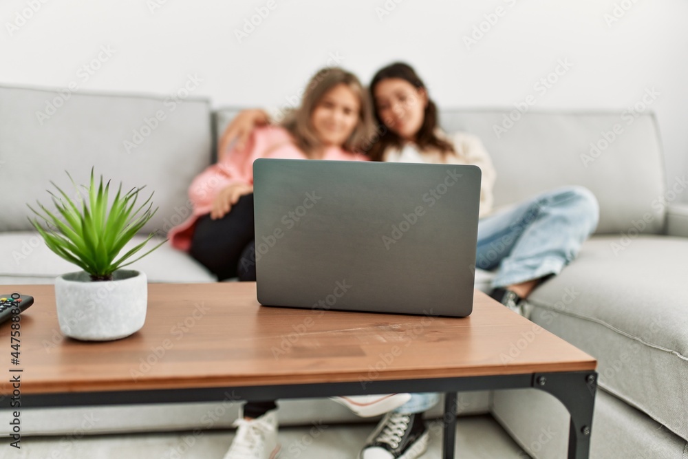 Young couple watching film sitting on the sofa at home. Young couple watching film sitting on the sofa at home.