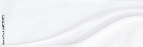 White gray satin texture that is white silver fabric silk panorama background with beautiful soft blur pattern natural.