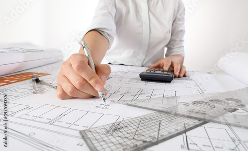 Cuadro en lienzo Architect Drawing Blueprint At Desk In Office