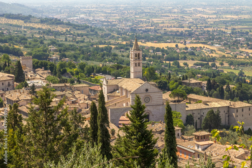 Landscape view of Assisi, Perugia, Italy depicting the Saint Clare Basilica