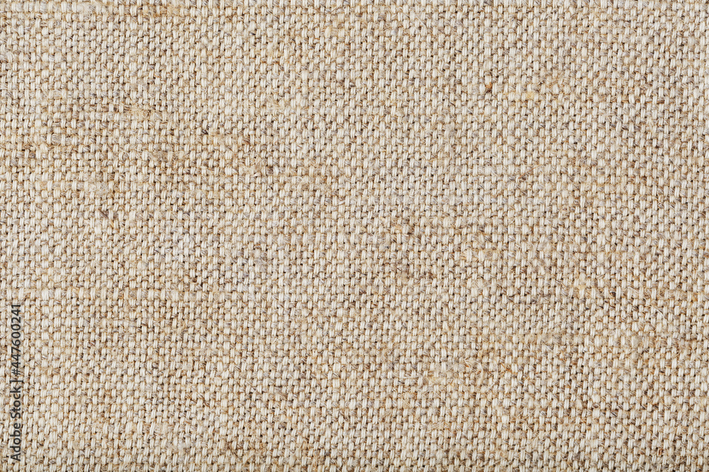 Burlap fabric with linen fibers as background. Burlap fabric with linen fibers as background.