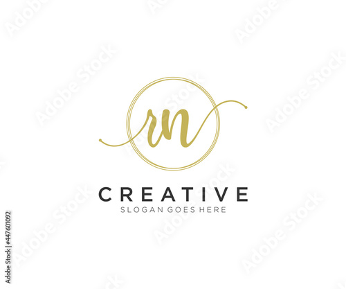 initial RN Feminine logo beauty monogram and elegant logo design, handwriting logo of initial signature, wedding, fashion, floral and botanical with creative template. photo