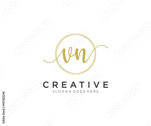 initial VN Feminine logo beauty monogram and elegant logo design, handwriting logo of initial signature, wedding, fashion, floral and botanical with creative template. photo