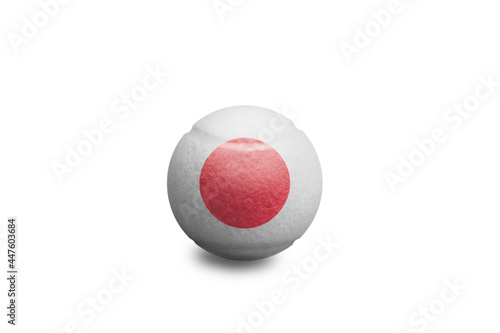 Tennis ball with the coloured national flag of  Japan on the white background	
