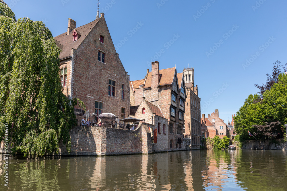 Typical canal and architecture in Bruges in Belgium Typical canal and architecture in Bruges in Belgium