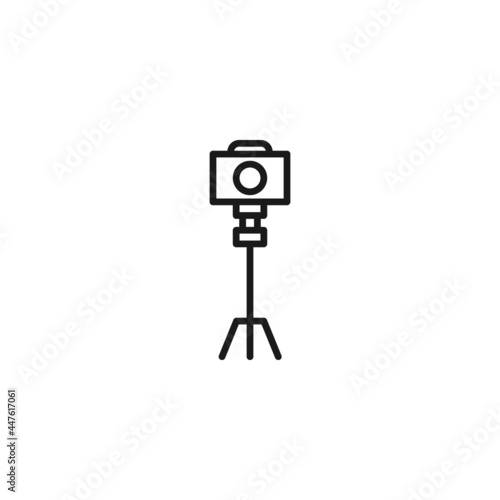 Line icon of photocamera on tripod