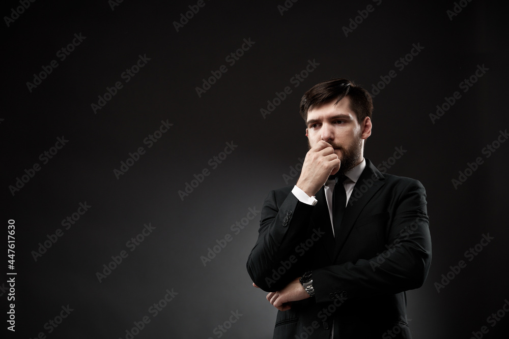 Serious thoughtful businessman in studio