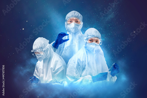 Health worker woman with a protective suit and gloves holding covid 19 vaccines

