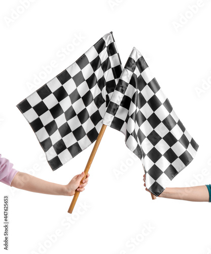 Hands with racing flags on white background