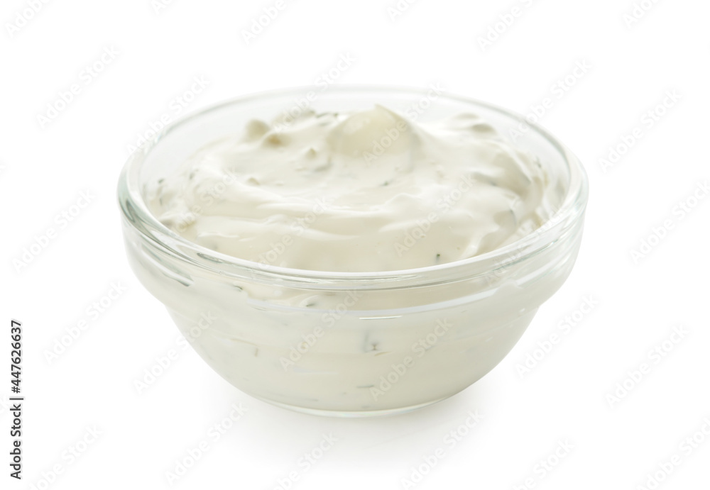 Glass bowl with tasty tartare sauce on white background Glass bowl with tasty tartare sauce on white background