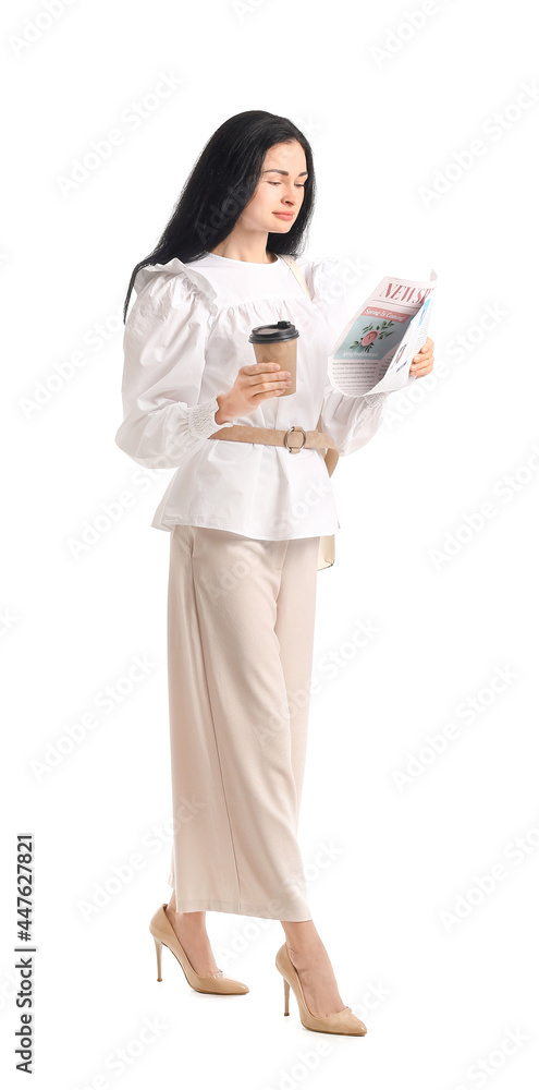 Young woman with cup of coffee reading newspaper on white background Young woman with cup of coffee reading newspaper on white background