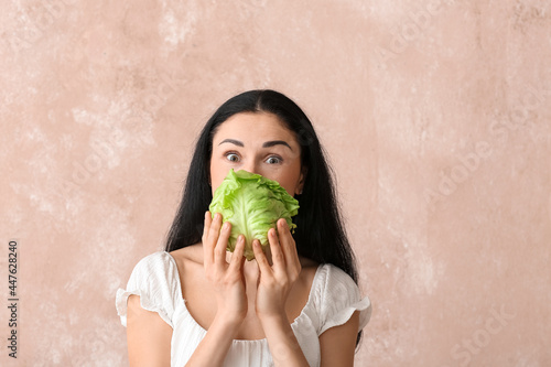 Young woman with fresh cabb...