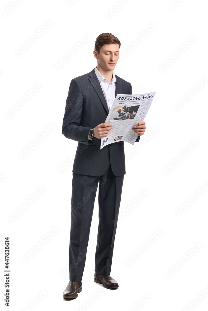 Young businessman reading newspaper on white background Young businessman reading newspaper on white background