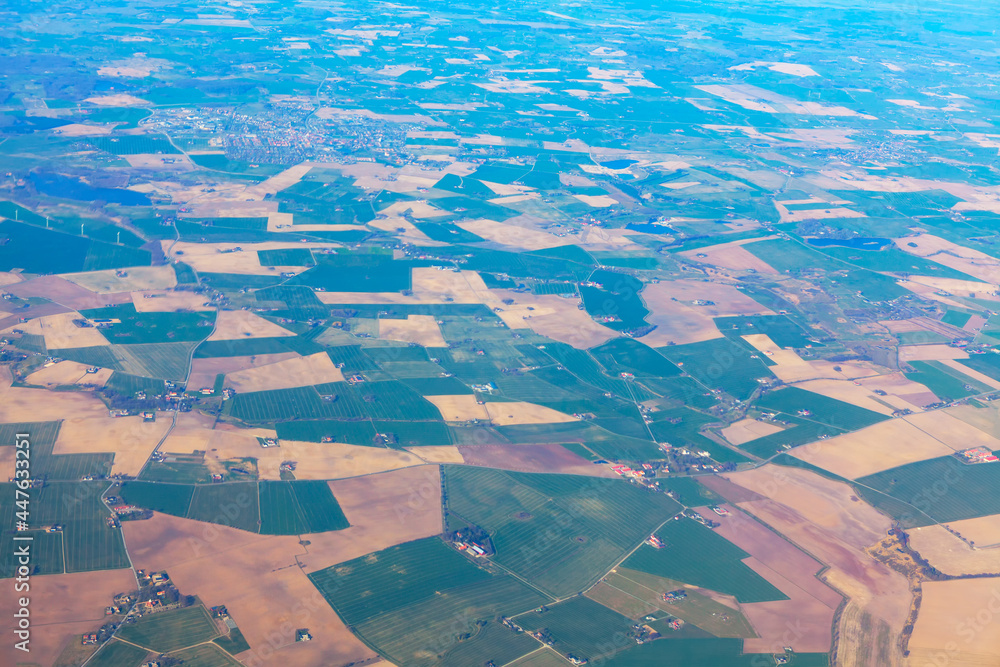 Fields view from airplane . Flying over Poland country 