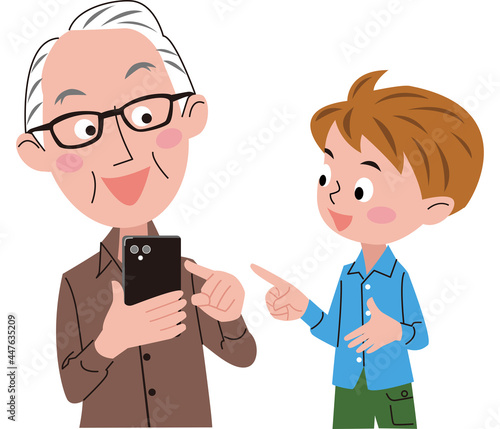 男の子が高齢者にスマホの操作を教えている