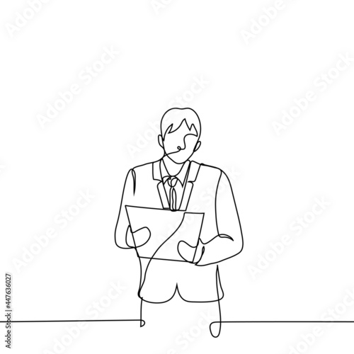 businessman stands with documents - one line drawing. conception: man in business suit holding tablet with papers