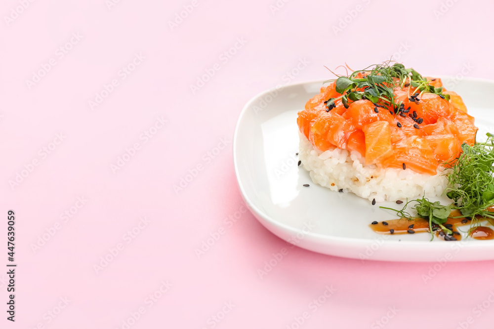 Delicious salmon tartar on color background Delicious salmon tartar on color background