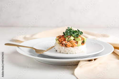 Fototapeta Naklejka Na Ścianę i Meble -  Delicious salmon tartar on light background