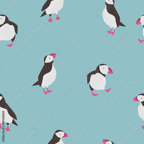 Seamless pattern with cute puffins in different poses